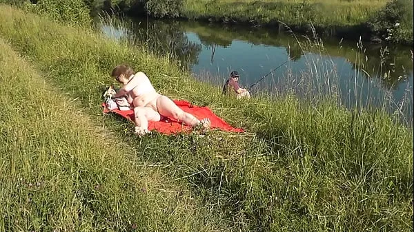 Fresh Naked in public. Public nudity. Nudist beach. Wild beach. MILF sunbathing naked near fisherman my Movies